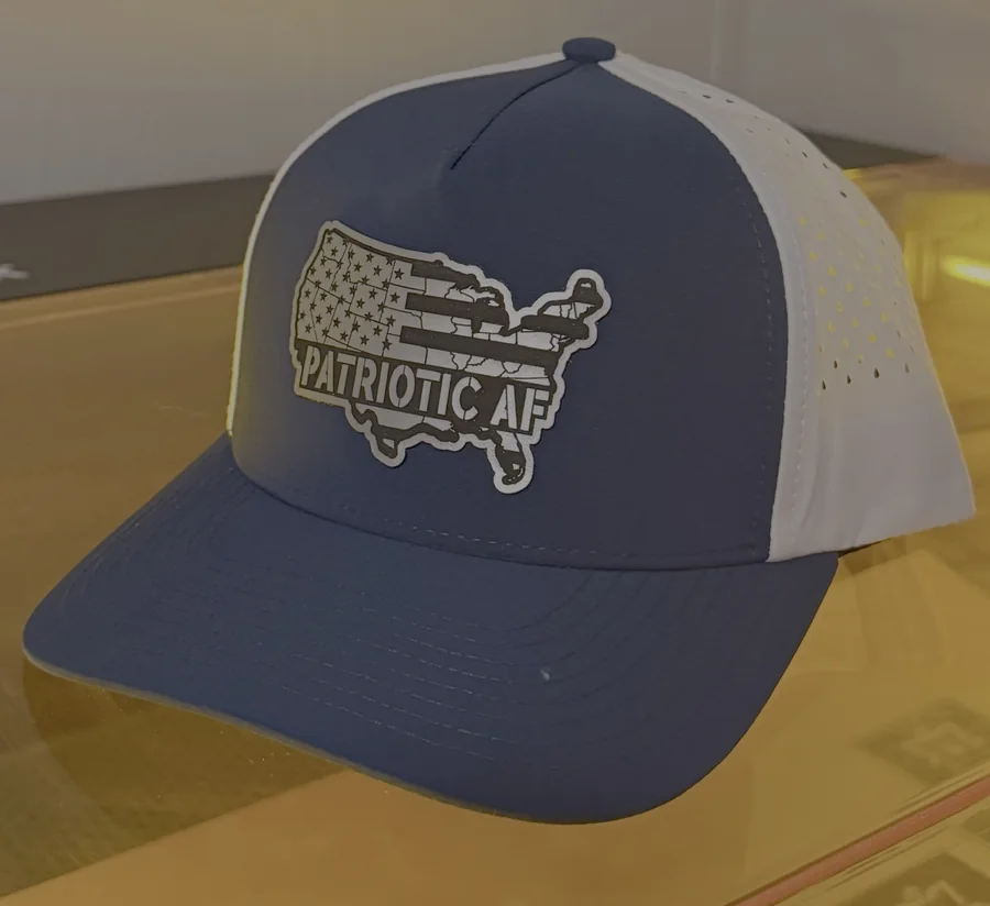 Blue and gray cap with a custom patriotic leatherette patch